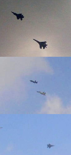 資料圖：AMF五代戰機在殲-11BS戰斗機的伴隨下進行通場飛行。